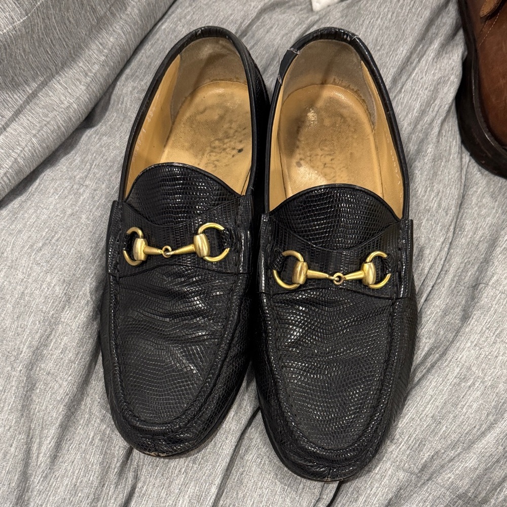 Men's Gucci Black Lizard Loafers with Gold Detailing